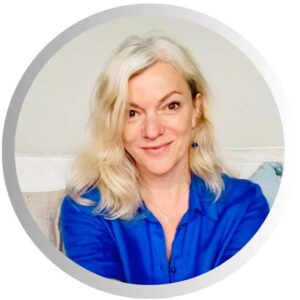 Janie Whittemore headshot in blue shirt facing camera